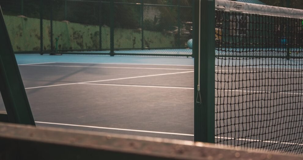 Coast Guard Tennis Loses to Emerson in NEWMAC Opener Despite Reice's Singles Win