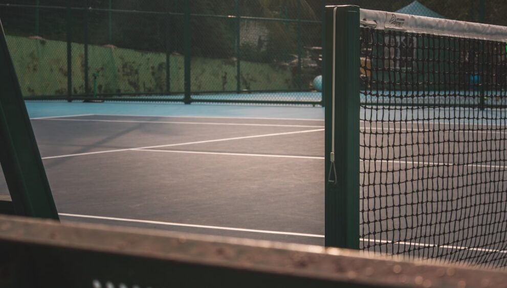 Coast Guard Tennis Loses to Emerson in NEWMAC Opener Despite Reice's Singles Win